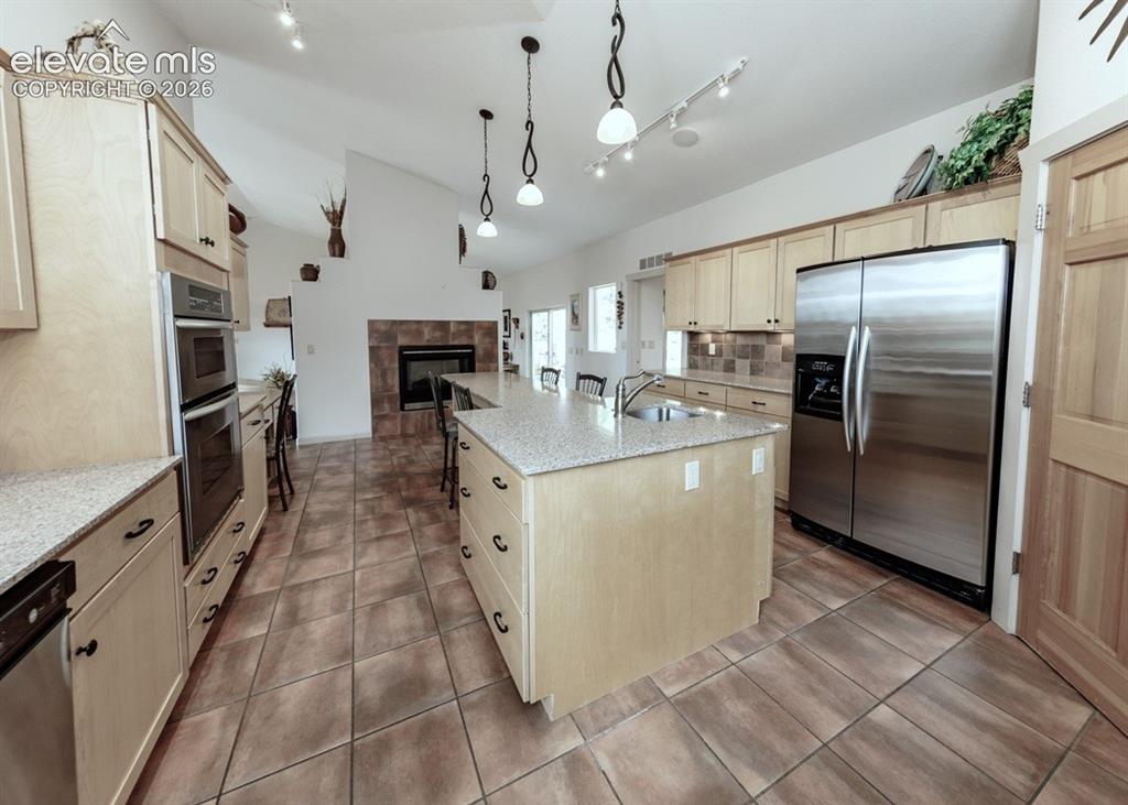 Image 9 of 50: Warming drawer, dual oven, convection microwave, country sink, prep sink, a