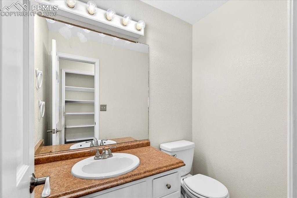 Image 16 of 48: Bathroom featuring vanity and toilet