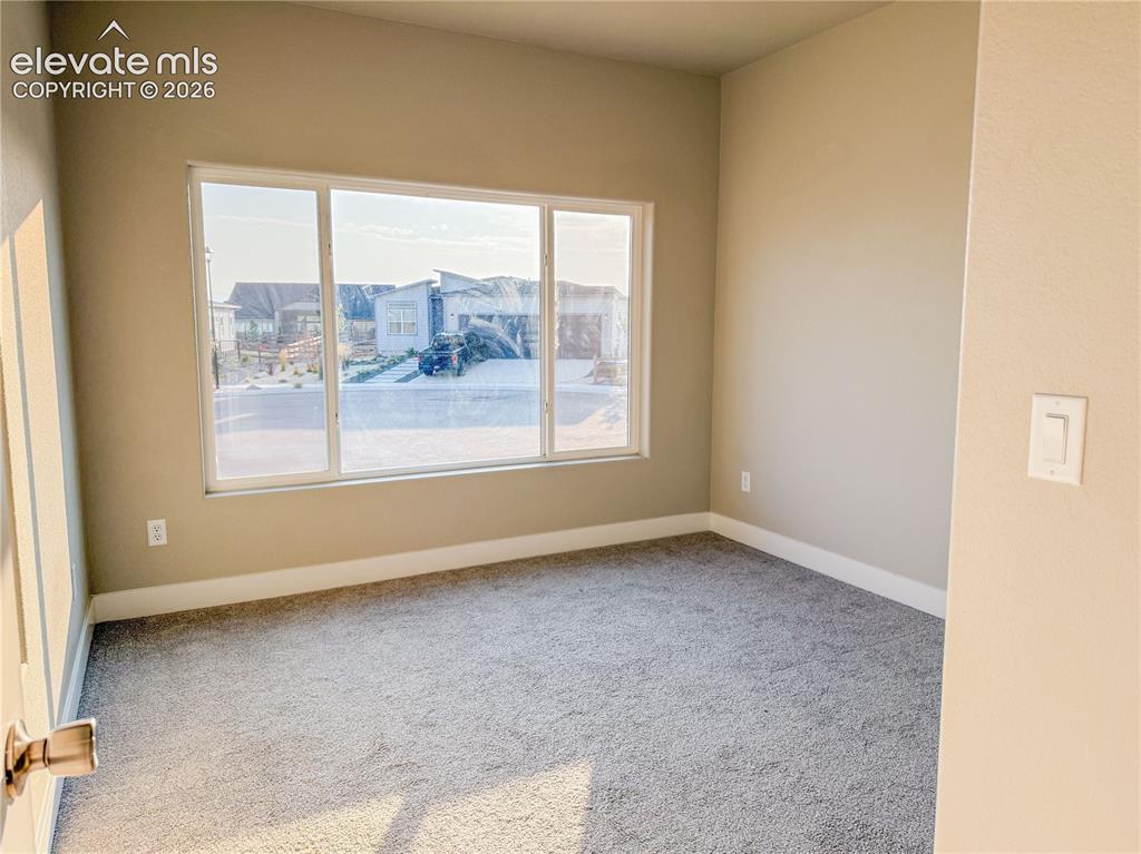 Image 5 of 50: Virtually Staged Office/Front bedroom