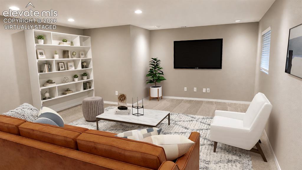 Image 21 of 25: virtually staged - 2nd family room