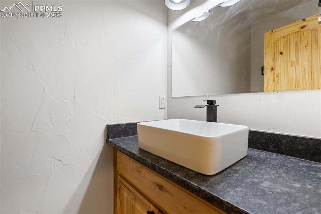 Image 35 of 50: Basement half bath