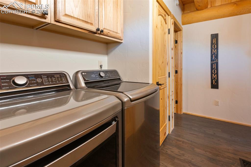 Image 37 of 50: Walk out to the wrap around porch from the laundry space.