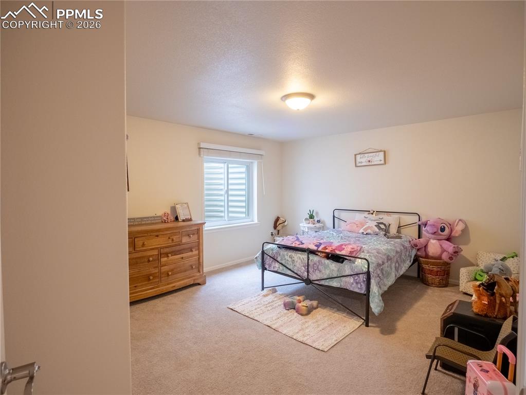 Image 40 of 50: Bedroom