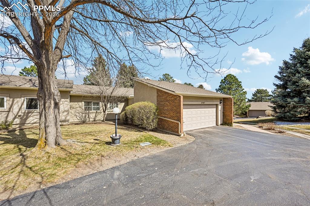 Image 41 of 41: Several guest parking spaces just steps from the home