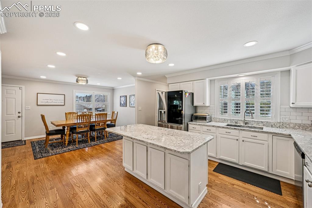 Image 8 of 41: Center island with bonus seating