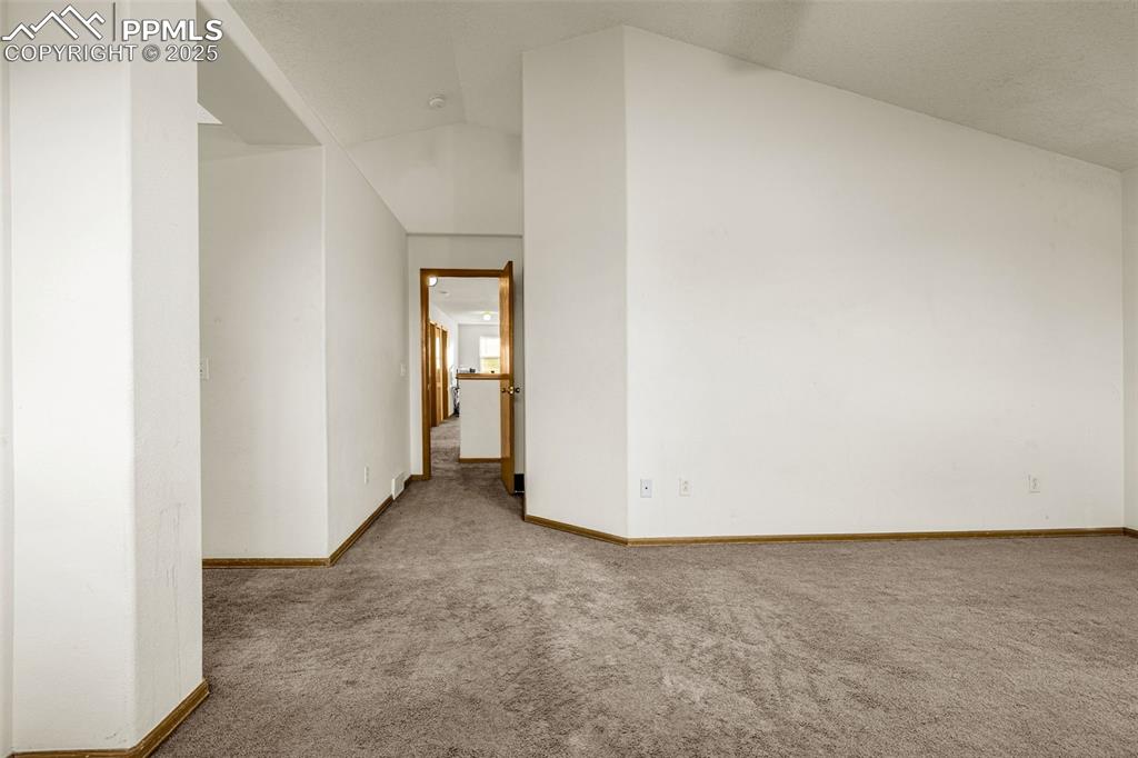 Image 17 of 40: Bonus room featuring carpet and baseboards
