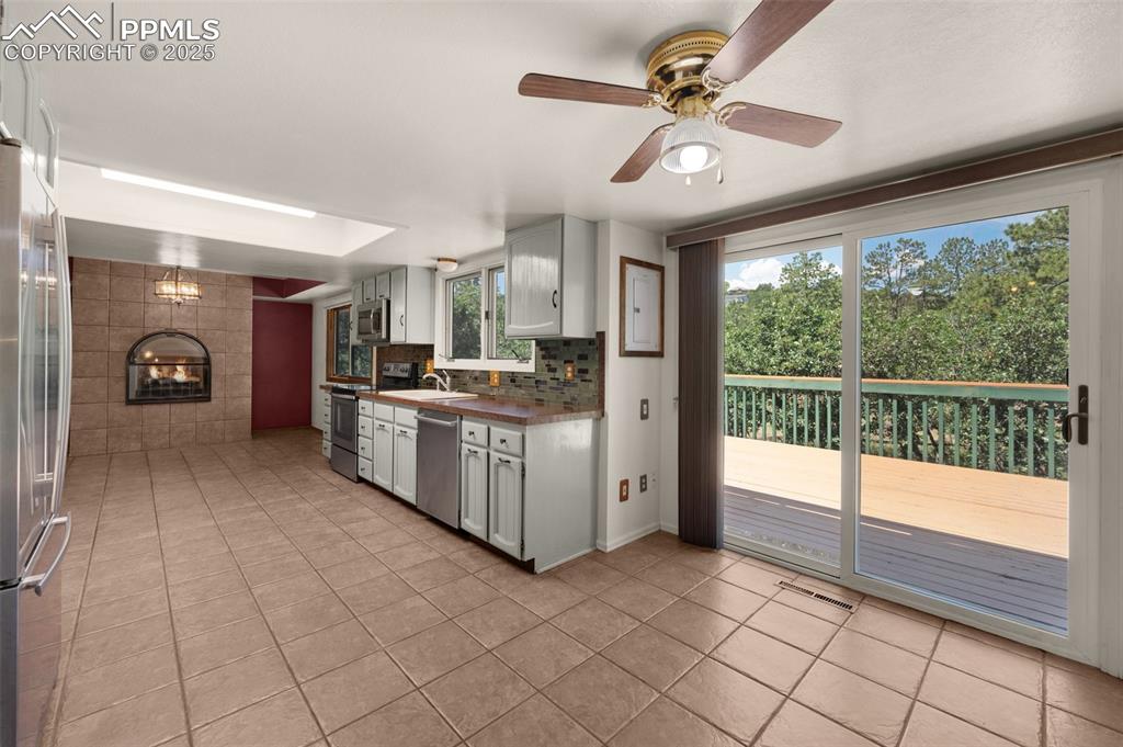 Image 22 of 47: walk out to deck with views