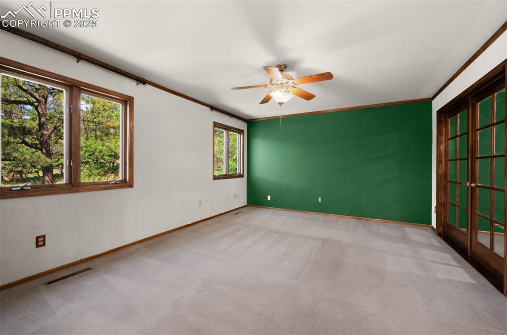 Image 28 of 47: with french doors leading to sitting area