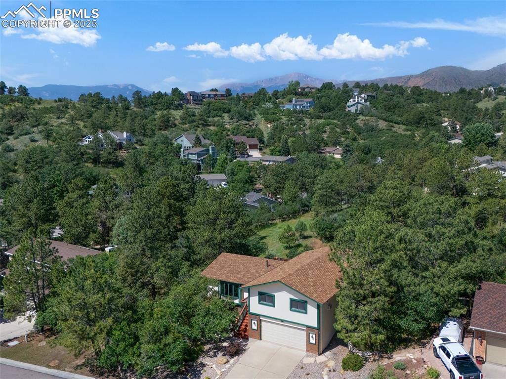 Image 4 of 47: Aerial view of a mountain backdrop