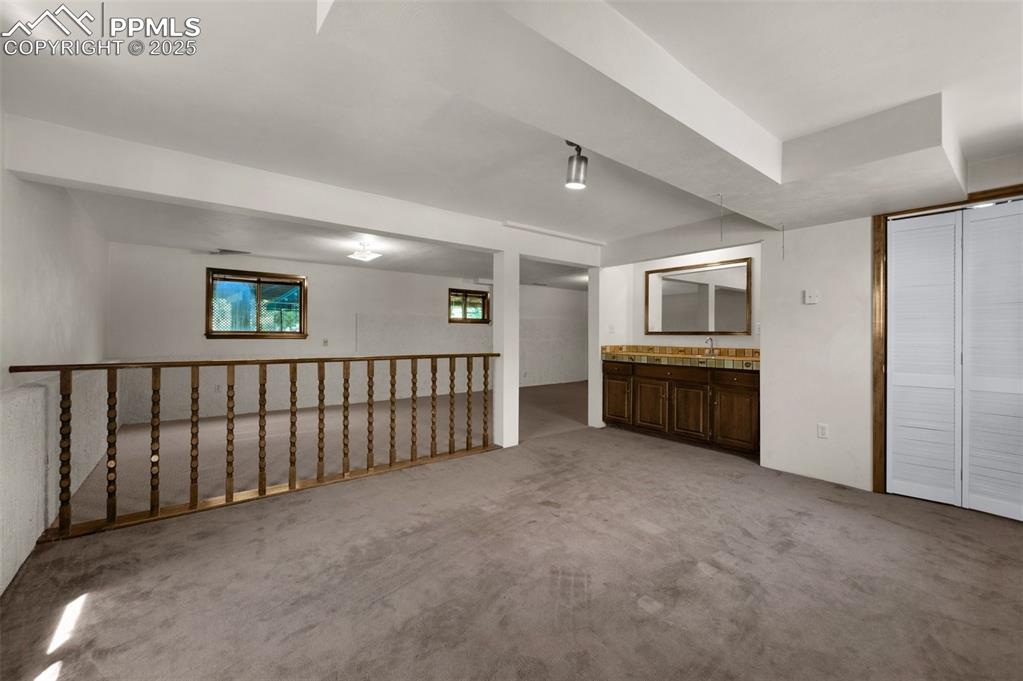 Image 43 of 47: wet bar in background