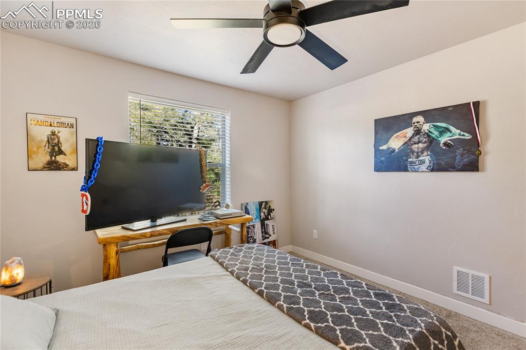 Image 22 of 38: Bedroom