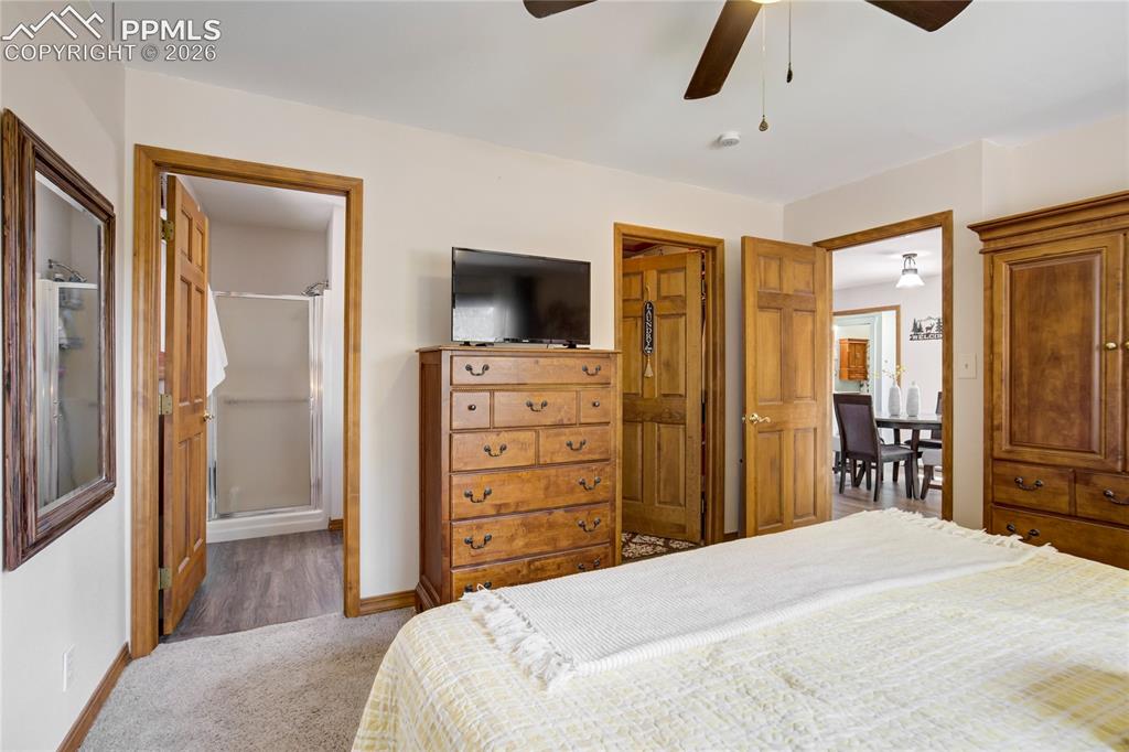 Image 16 of 50: A private bathroom and closet in primary