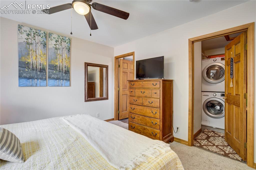 Image 17 of 50: Convenience of laundry in primary closet