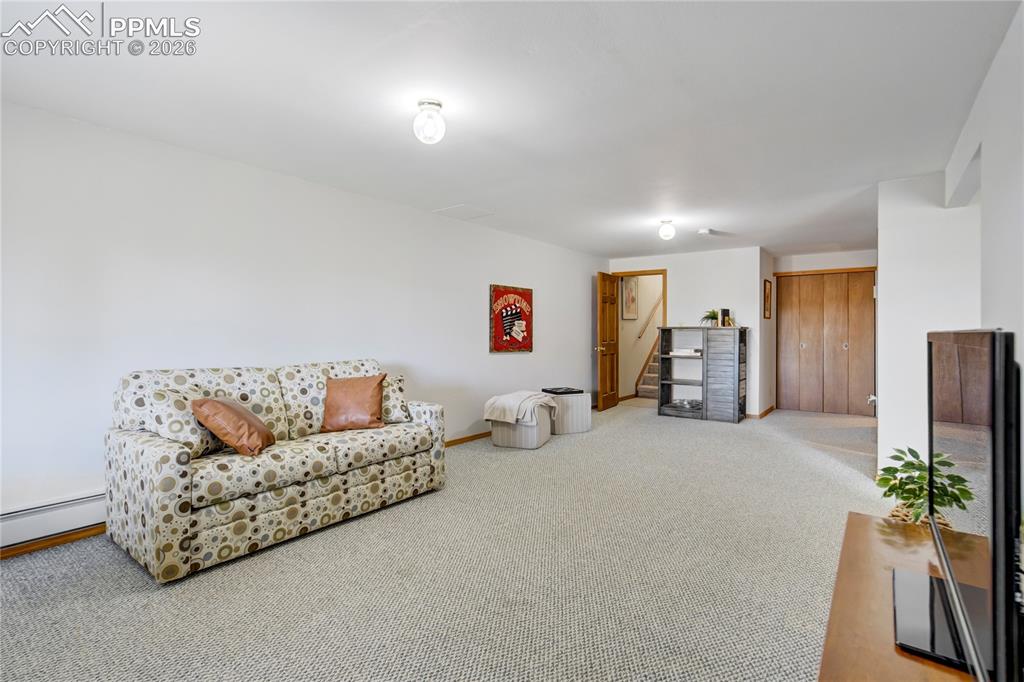 Image 27 of 50: Lower level offers flexible space