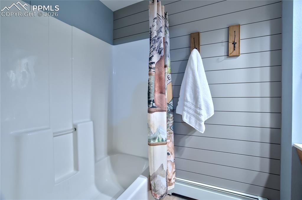Image 35 of 50: Full bathroom is ideal for the basement