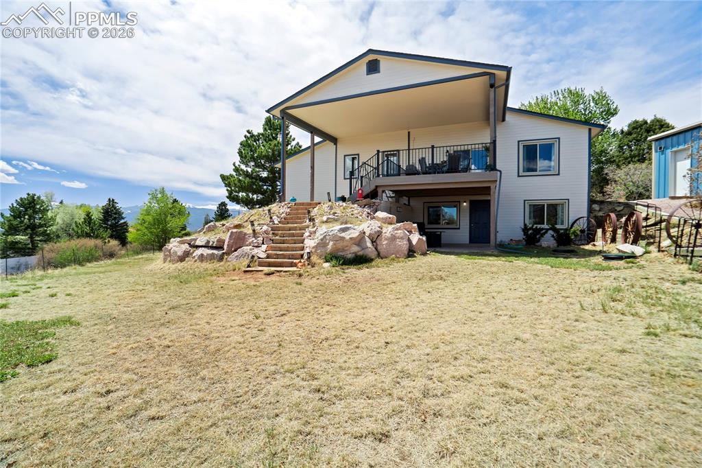Image 40 of 50: Amazing yard in back and sides of home