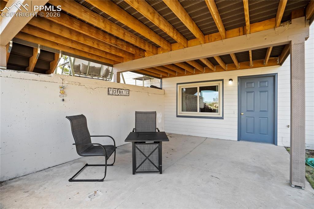 Image 41 of 50: A private patio outside the lower level