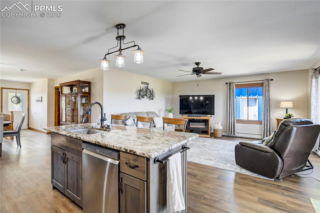 Image 8 of 50: Kitchen opens to family room