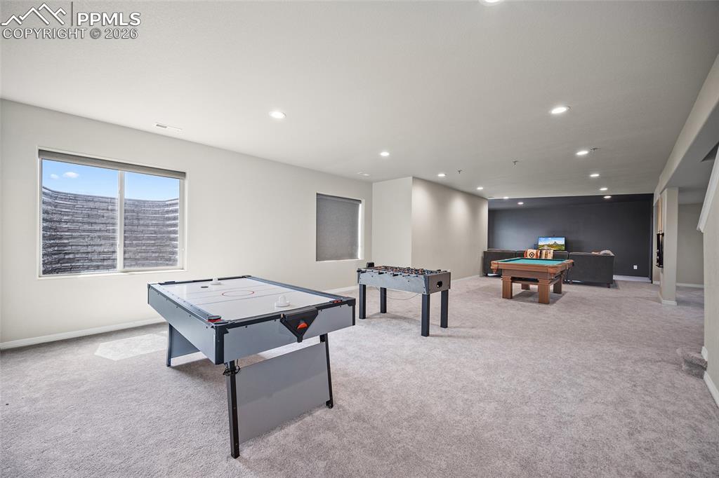 Image 41 of 50: Recreation room featuring billiards, recessed lighting, and light carpet