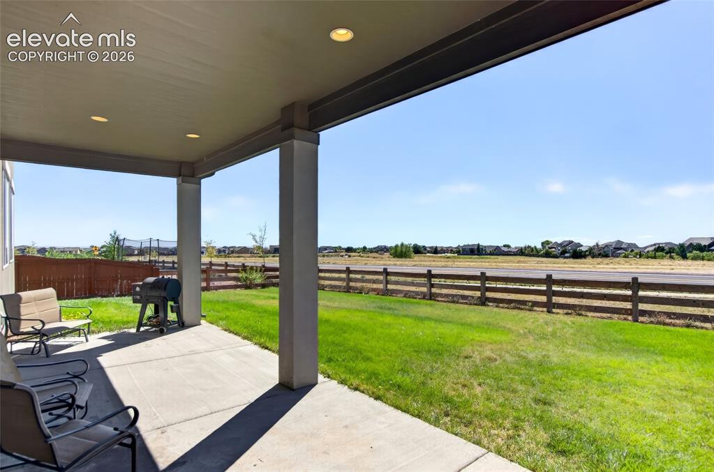 Image 27 of 35: Covered patio featuring recessed lighting, concrete flooring, and direct ac