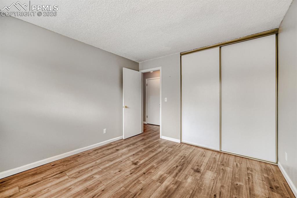 Image 19 of 32: tucked at the back of the condo for privacy