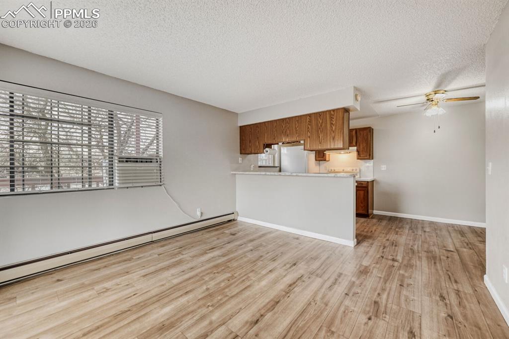 Image 9 of 32: Open to Kitchen with lots of natural light