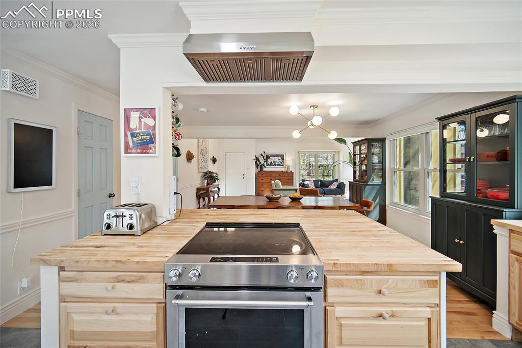 Image 13 of 50: Butcher block counter tops. 