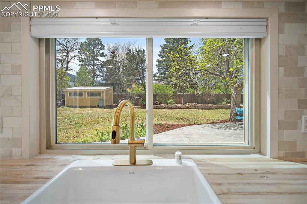 Image 16 of 50: Looking over the backyard. 