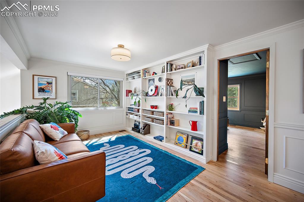 Image 23 of 50: Built in shelving in the loft over looking the Great room!