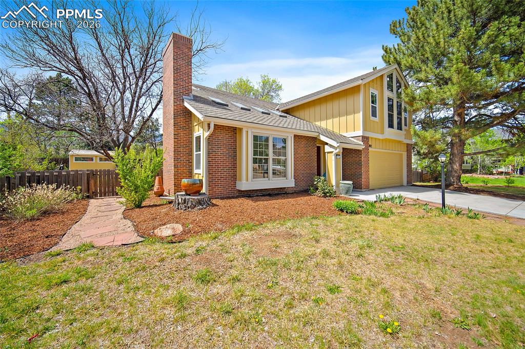 Image 3 of 50: Great sized lot that if fully landscaped and backyard is fully fenced.  