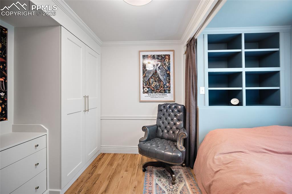 Image 36 of 50: Upper-Level Bedroom. 