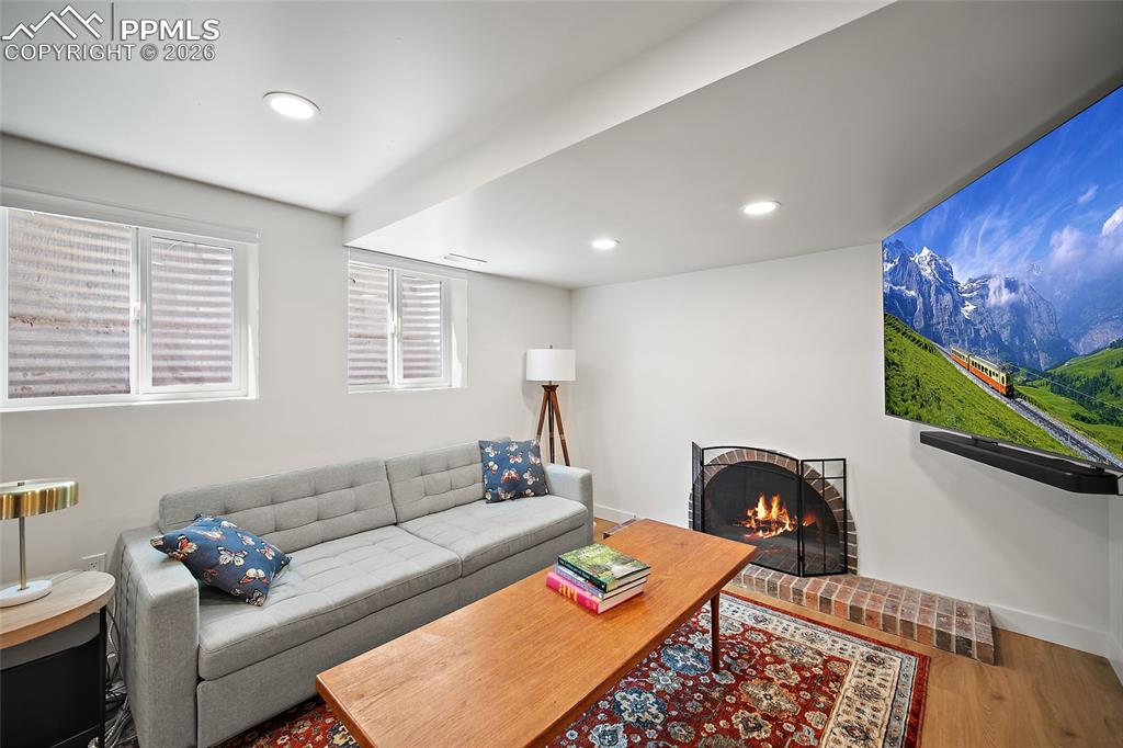 Image 40 of 50: With a wood Burning fireplace. 