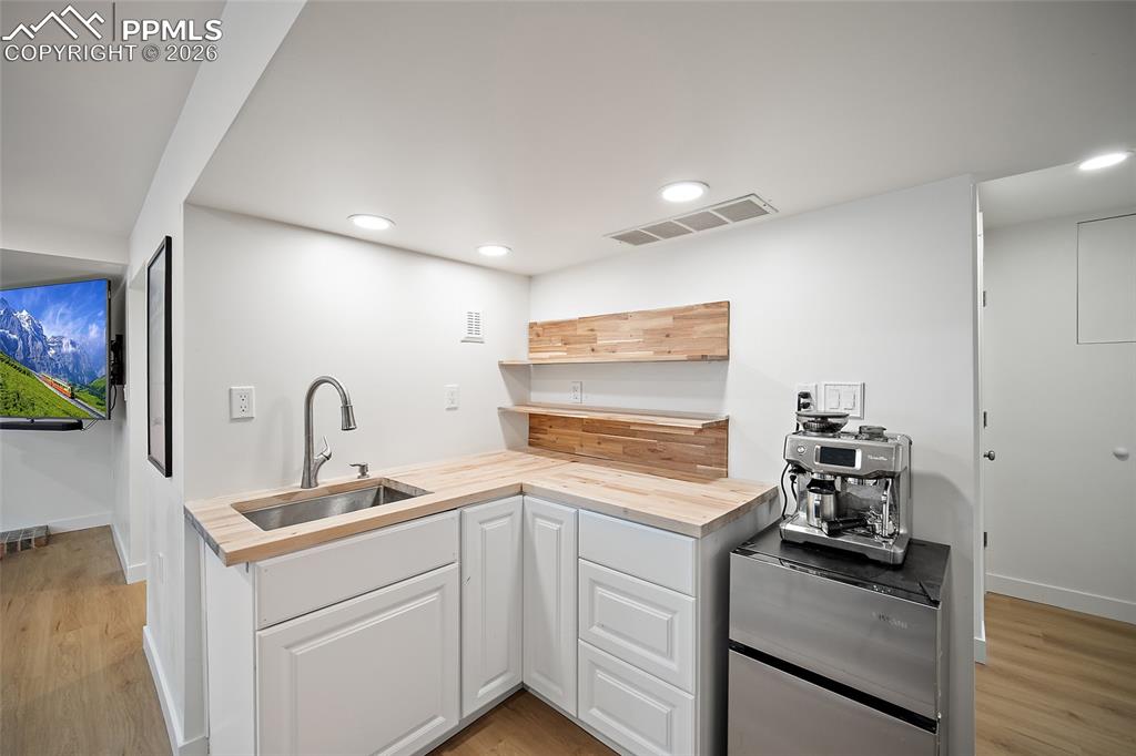 Image 42 of 50: Lower- Level kitchenette. 