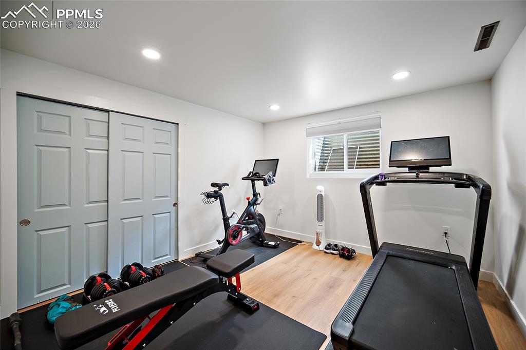 Image 44 of 50: Lower level Bedroom being used as a gym. 