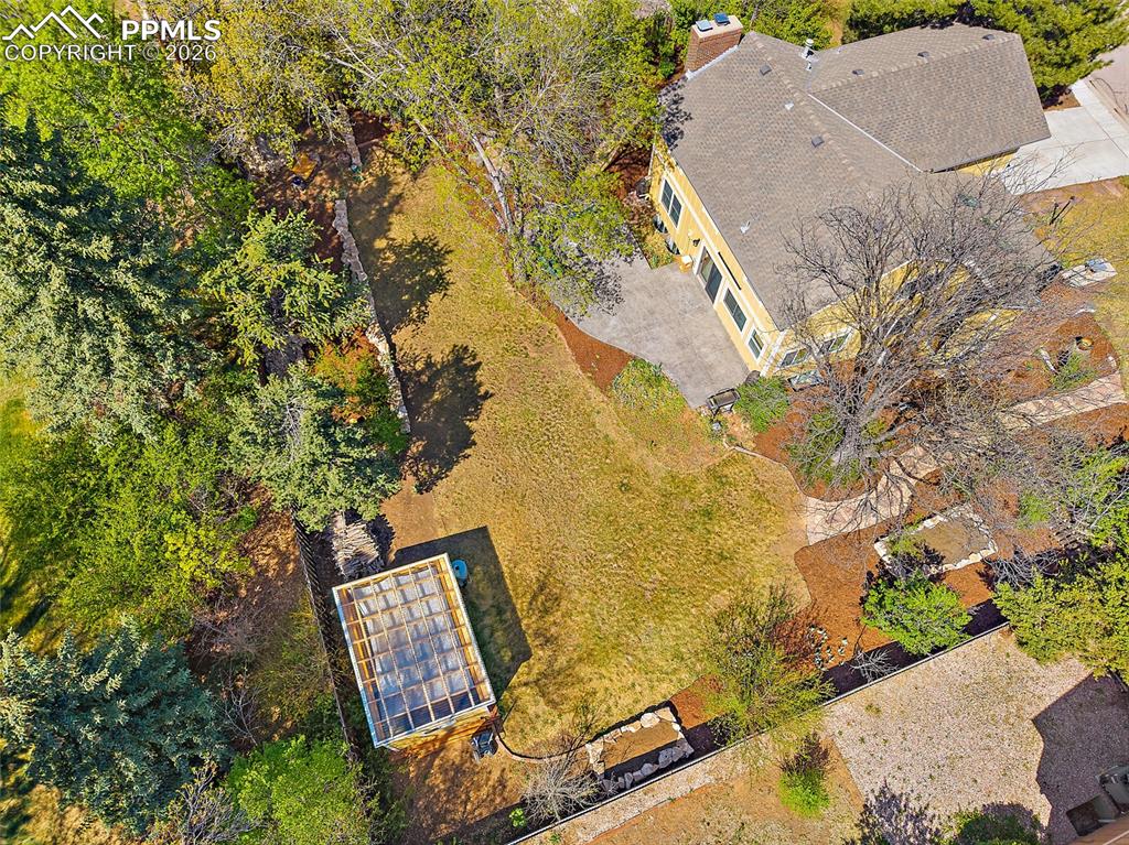 Image 50 of 50: One of the 2 storage sheds. Potting shed has see-through roof, great for gr