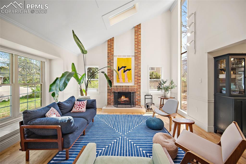 Image 6 of 50: The floor either side of the fireplace is reinforced so you can put heavy p