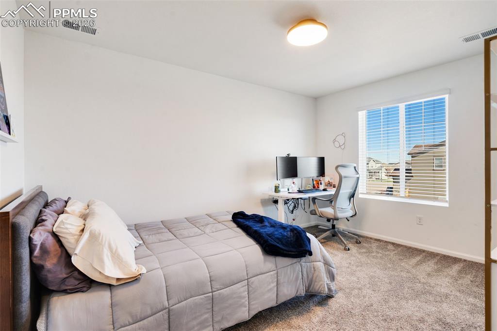 Image 26 of 38: Bedroom