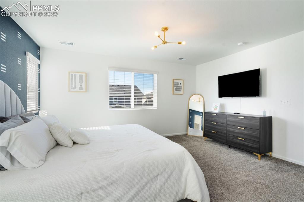 Image 31 of 38: Bedroom