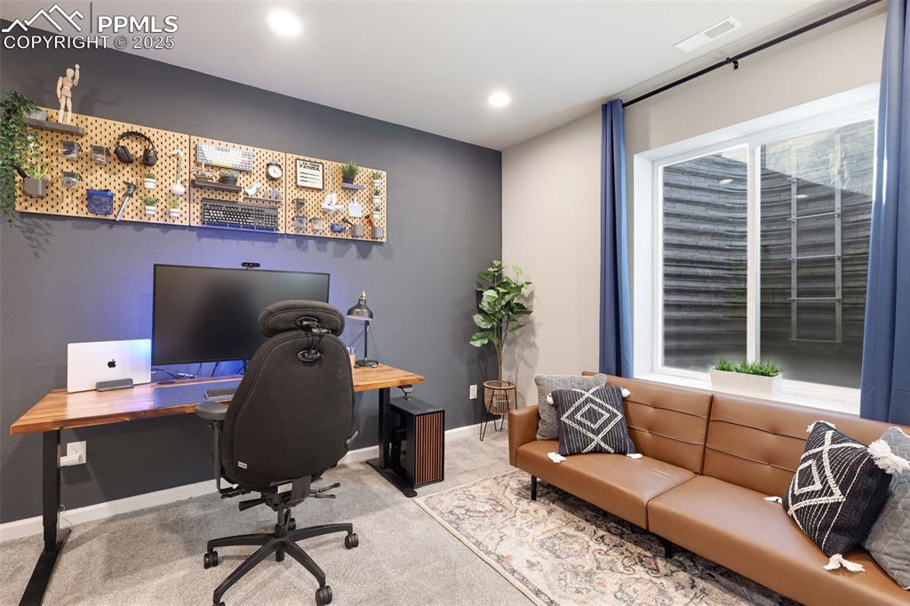 Image 30 of 39: Carpeted office featuring baseboards