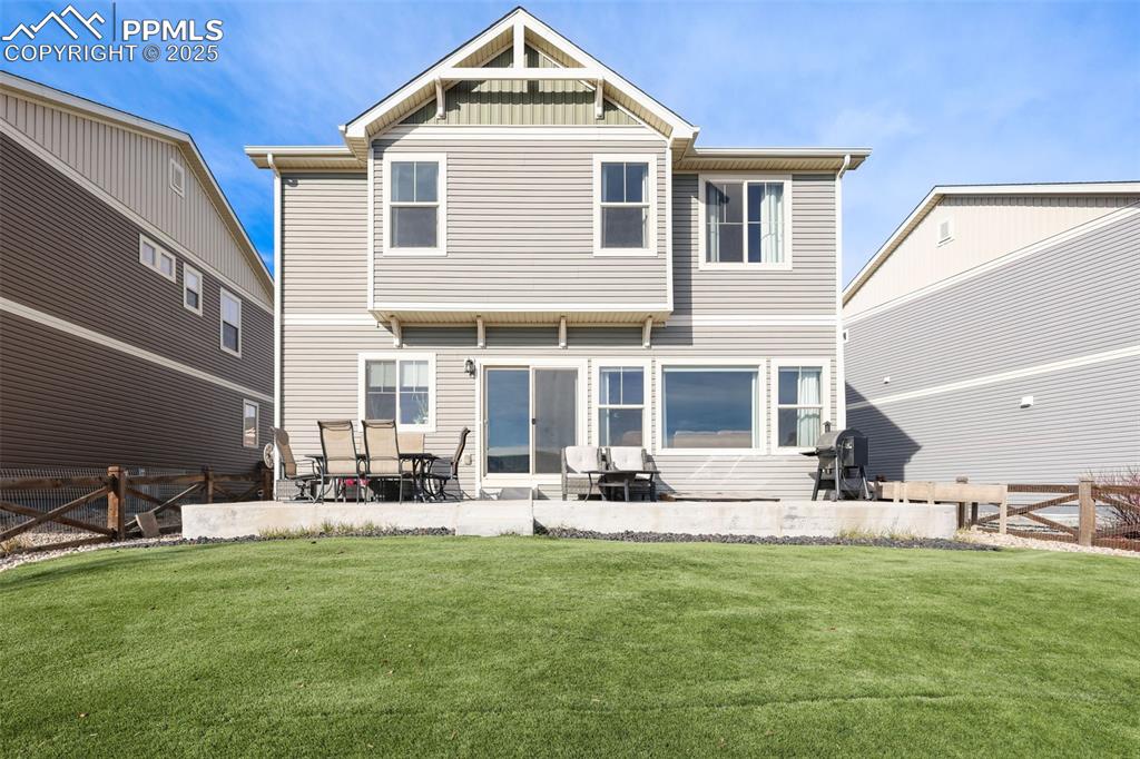 Image 33 of 39: Rear view of property with a patio area