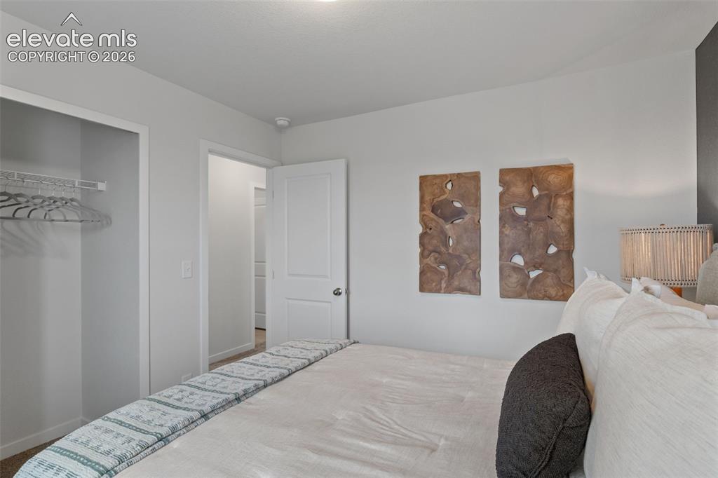 Image 8 of 34: Bedroom