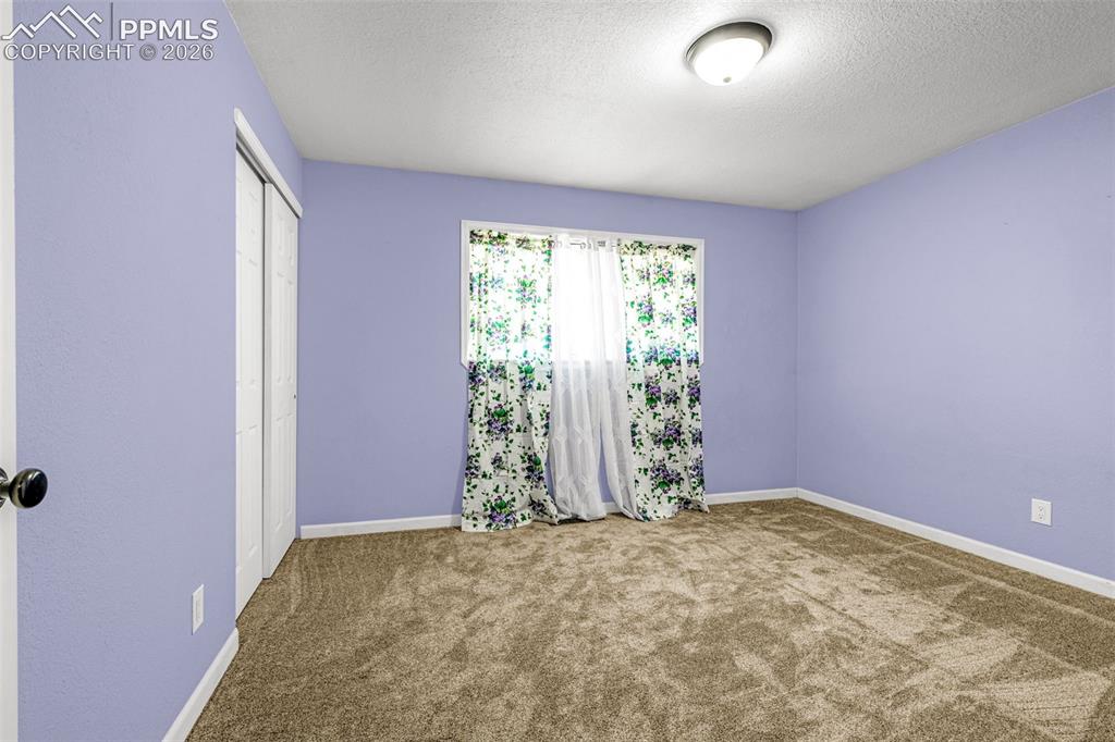 Image 14 of 21: New carpet in 2nd bedroom