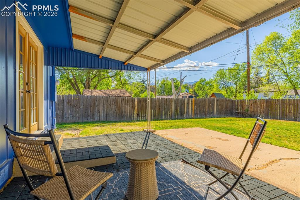 Image 16 of 21: Covered patio