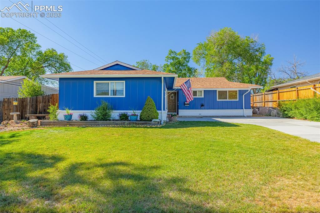Image 21 of 21: Ranch with 2 car garage and wide driveway and new gate to backyard