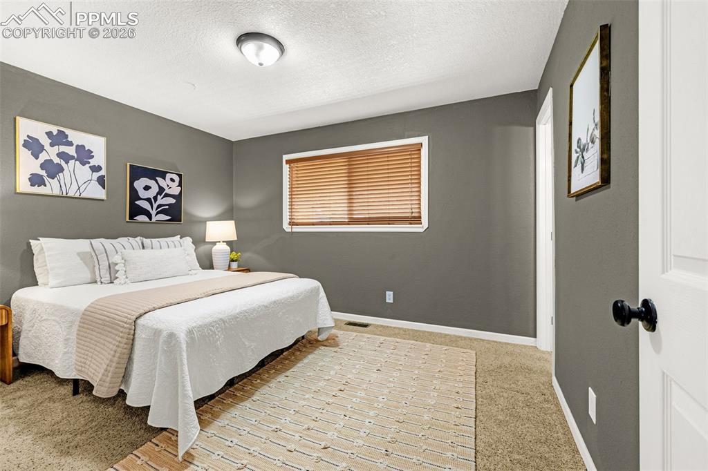 Image 9 of 21: Primary Bedroom with bath