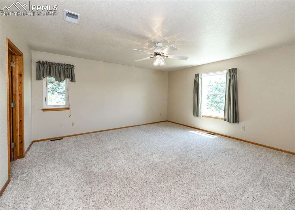 Image 27 of 50: Master Bedroom