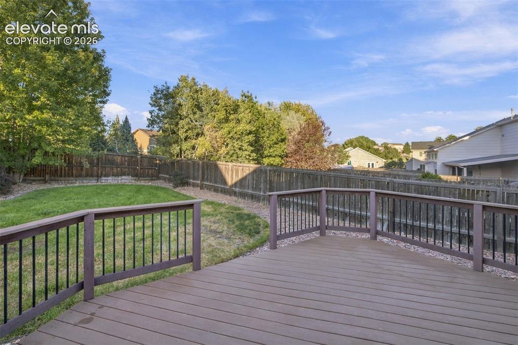 Image 16 of 18: Backyard Deck