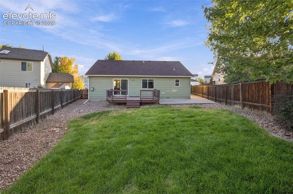 Image 18 of 18: Backyard with room to run & play