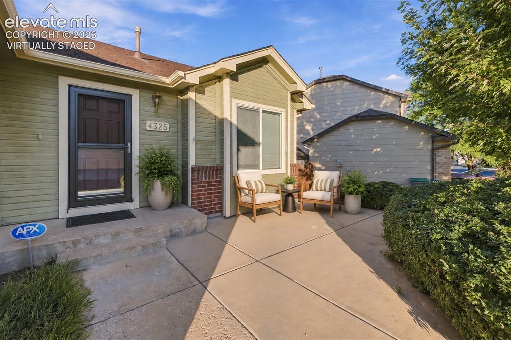 Image 3 of 18: Front Patio-Virtually Staged
