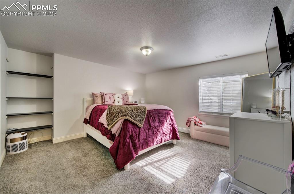 Image 32 of 50: Bedroom